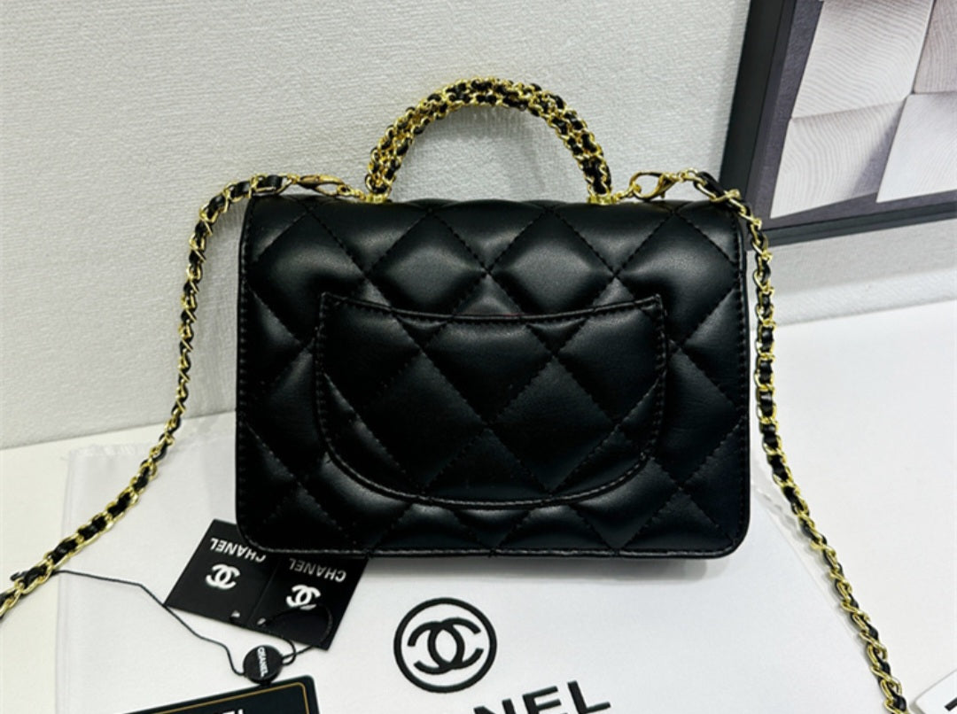 Chanel 24 top handle flap
