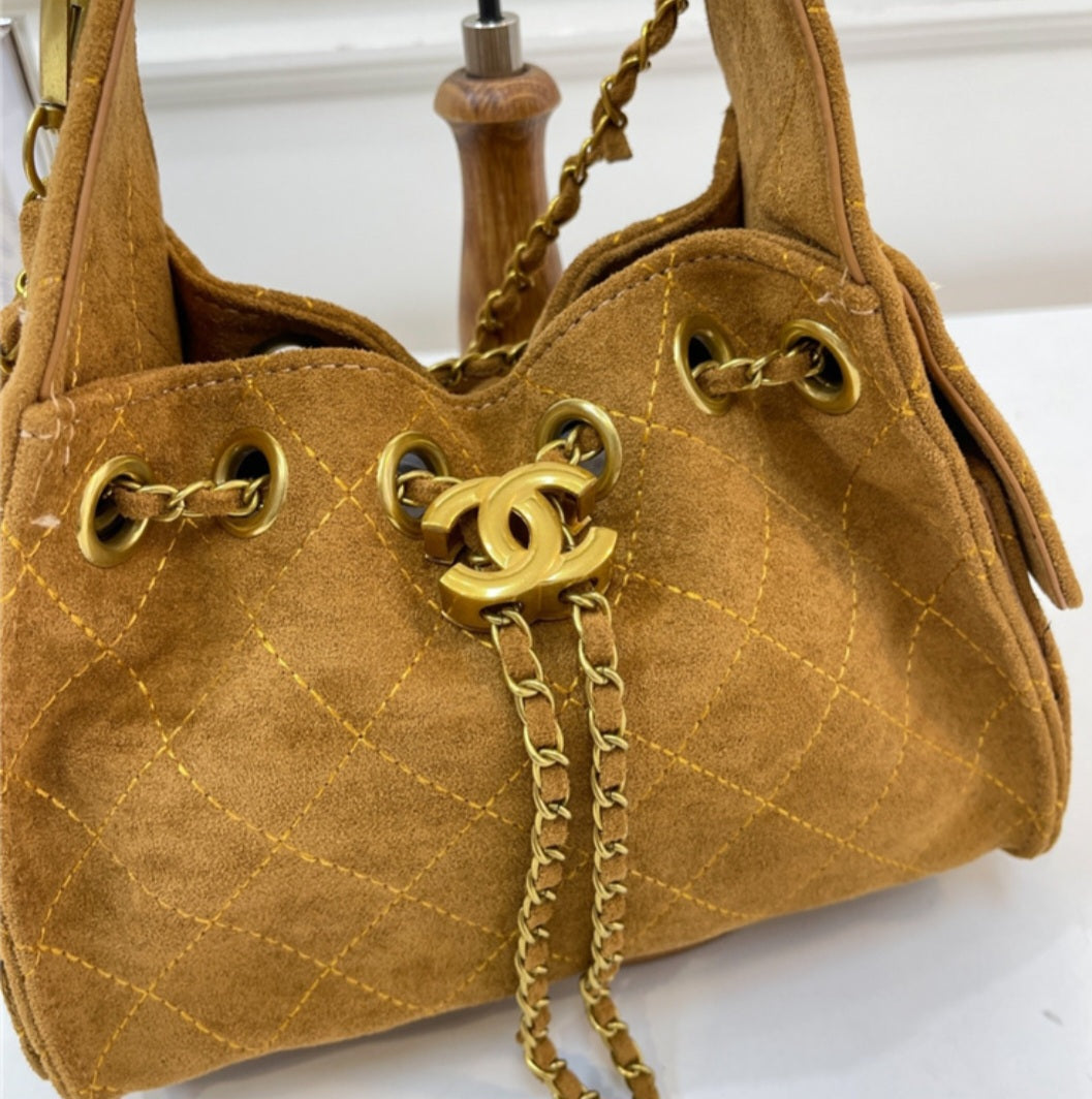 Chanel 25 suede mini