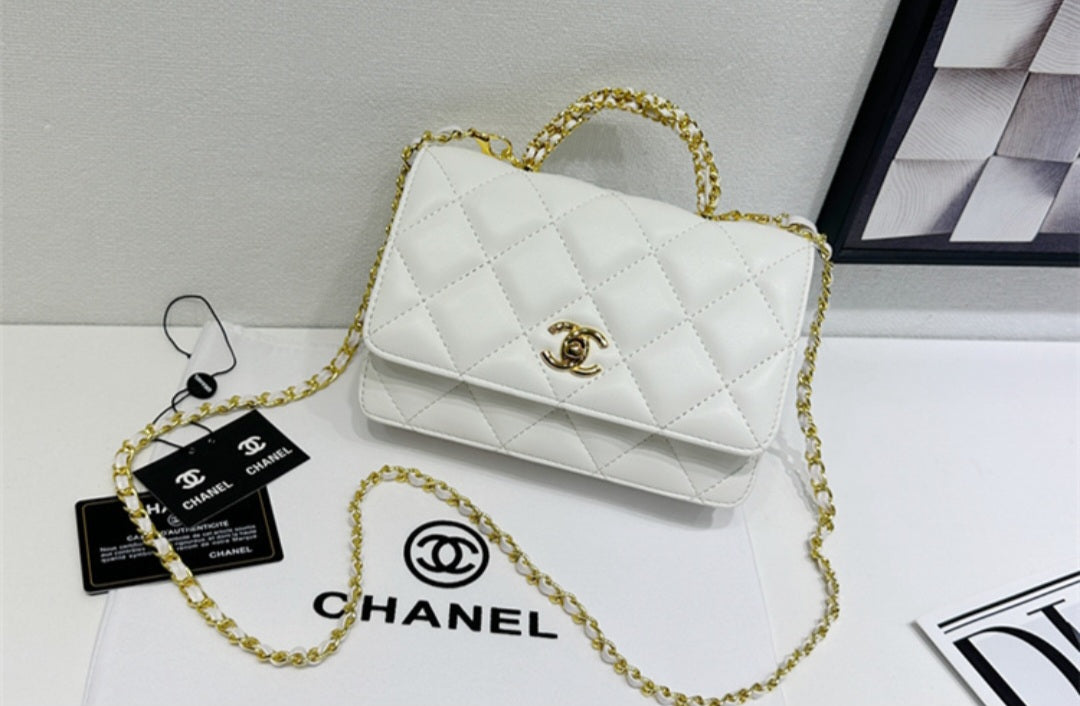 Chanel 24 top handle flap