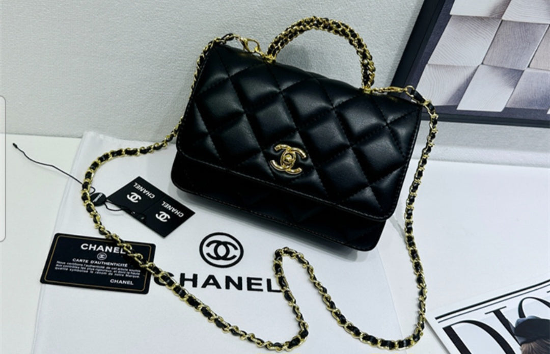 Chanel 24 top handle flap